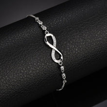 Load image into Gallery viewer, Shining Diva Fashion Latest Stylish Infinity Crystal Charm Silver Plated Bracelet for Women and Girls (10672b) Free Size