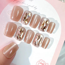 Load image into Gallery viewer, Secret Lives Cats Eye Reusable Artificial Nude Brown Color with Golden Glitter & Crystal Design Press on Nails 24 Pieces Set with Kit