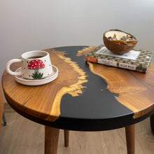 Load image into Gallery viewer, Round Live Edge Black Resin Side Table made with Oleaster Wood, Small Coffee Table, End Table with Wooden Tapered Legs, Matte Finish