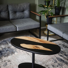 Load image into Gallery viewer, Epoxy Resin Black oval coffee table, rustic home decor, wooden side table, accent table, unique coffee table, rustic table, black river epoxy table