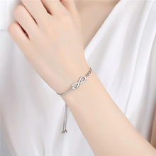Load image into Gallery viewer, Shining Diva Fashion Latest Stylish Infinity Crystal Charm Silver Plated Bracelet for Women and Girls (10672b) Free Size
