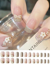 Load image into Gallery viewer, Secret Lives Acrylic Fake Reusable False Artifical Press On Nails Translucent Pink Color With Silverish Golden Glitter 3D Flowers And Pearl Design 24 Pieces With Kit
