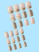 Load image into Gallery viewer, Secret Lives Acrylic Fake Reusable False Artifical Press On Nails Translucent Pink Color With Silverish Golden Glitter 3D Flowers And Pearl Design 24 Pieces With Kit
