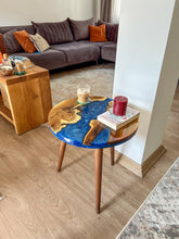 Load image into Gallery viewer, Round Blue River Wooden Coffee Table made with live edge wild olive wood, End Table with Wooden Tapered Legs, Modern Resin Side Table
