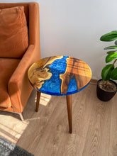 Load image into Gallery viewer, Round Blue River Wooden Coffee Table made with live edge wild olive wood, End Table with Wooden Tapered Legs, Modern Resin Side Table
