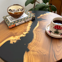 Load image into Gallery viewer, Round Live Edge Black Resin Side Table made with Oleaster Wood, Small Coffee Table, End Table with Wooden Tapered Legs, Matte Finish
